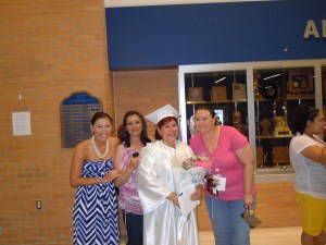 My mom, my sisters, and I at my mother's high school graduation. My mother went back to school at the age of 52 to get her high school diploma. 